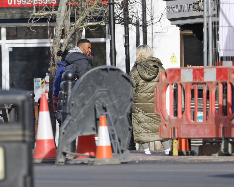 The pair were seen with his mum Sandra outside her shop in Essex