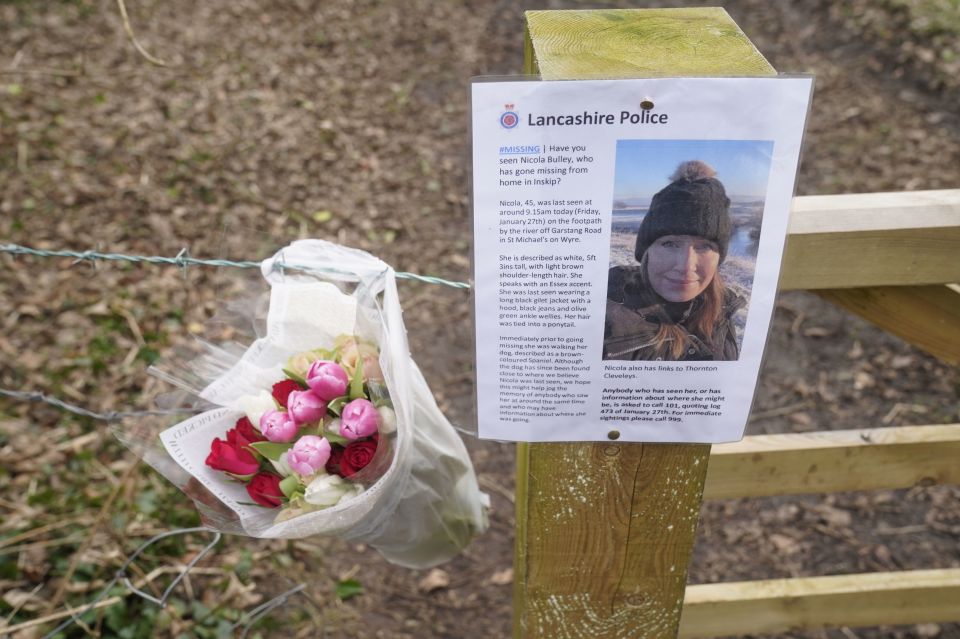 Flowers left by a missing sign in St Michael’s on Wyre, Lancashire