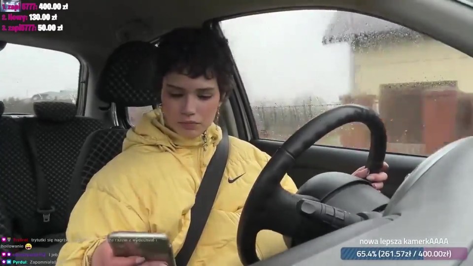 Footage shows Twitch user Sidneuke looking down at her phone while driving live on camera