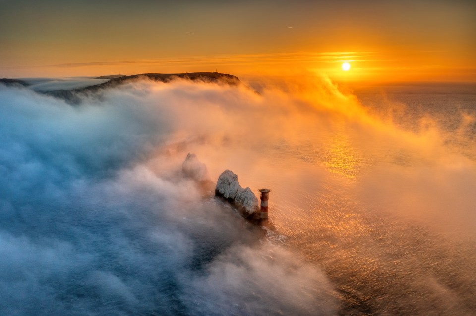 The Needles on the Isle of Wight emerging from fog