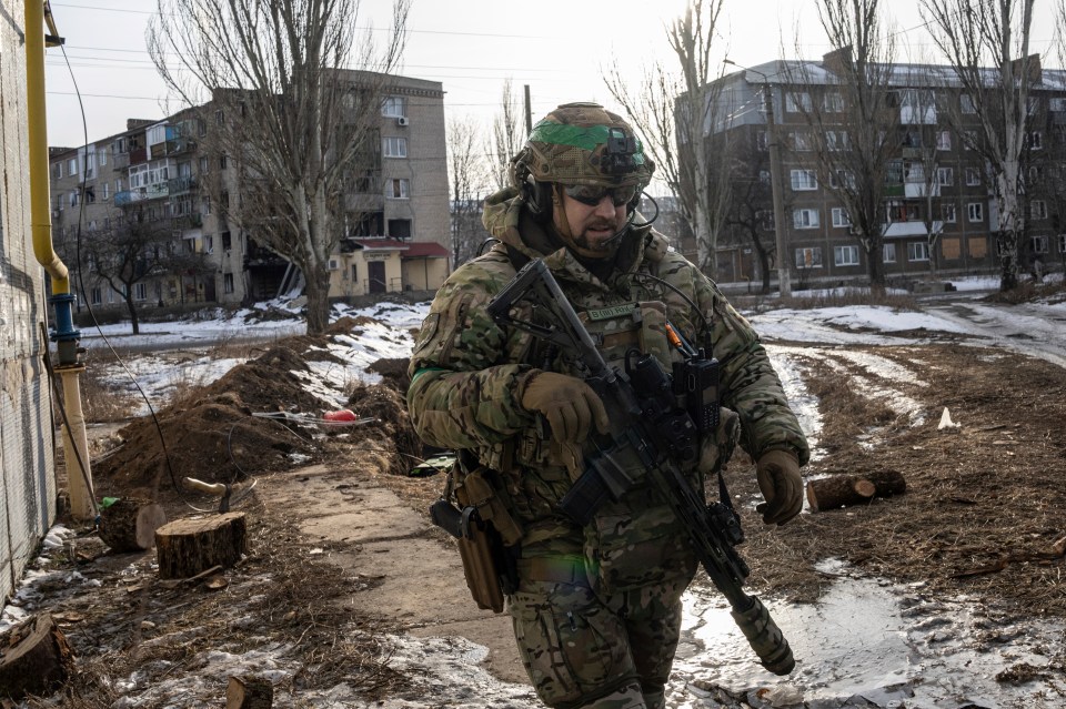 A Ukrainian serviceman of Rapid Operational Response Unit patrols in Bakhmut