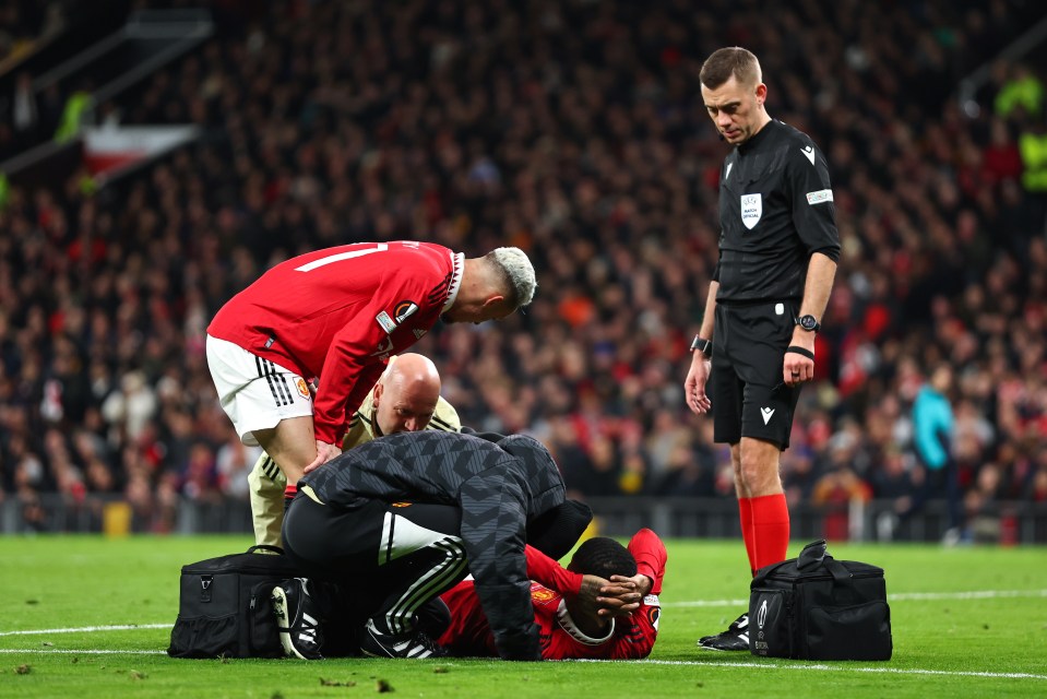 Marcus Rashford needed treatment after picking up a knock late in Man Utd's win over Barcelona