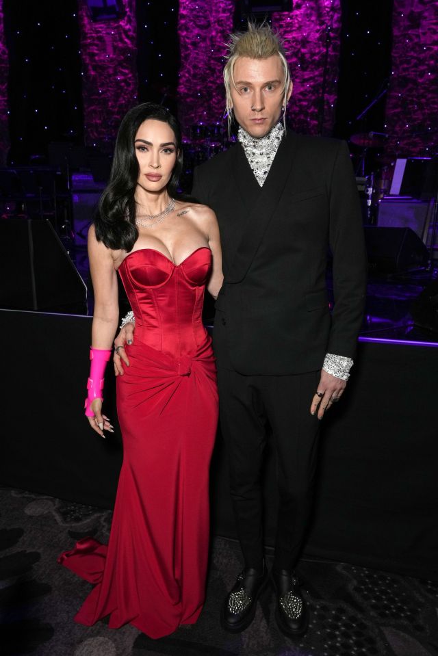 Megan Fox looked racy in a strapless red number with her partner Machine Gun Kelly