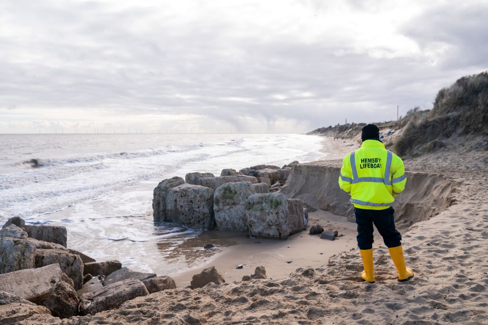 Two properties are in danger of falling into the sea and local lifeboat crews cannot launch their boats