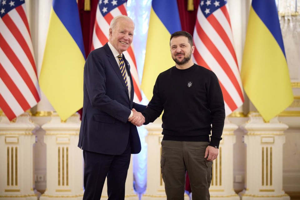 Joe Biden and Volodymyr Zelensky shake hands in a historic moment in Kyiv