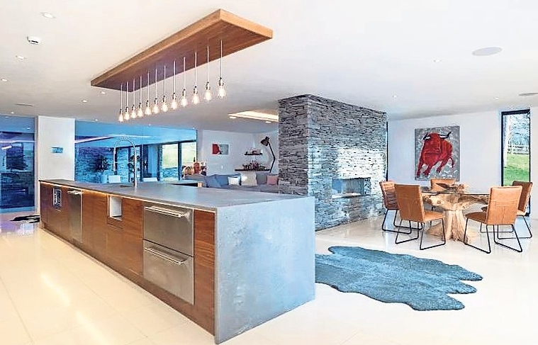 The kitchen boasts an impressive island as its centrepiece