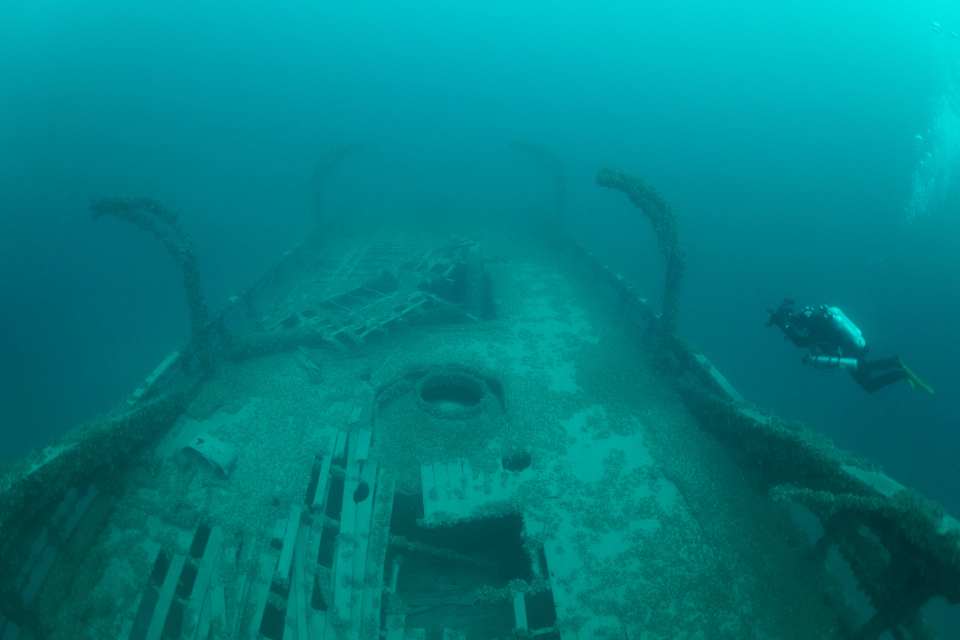 Divers are desperate to delve deeper inside the wreckage to find its treasures