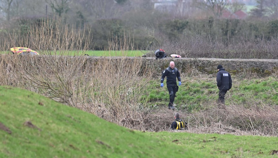 Police divers were seen entering the water today after the scene was closed off