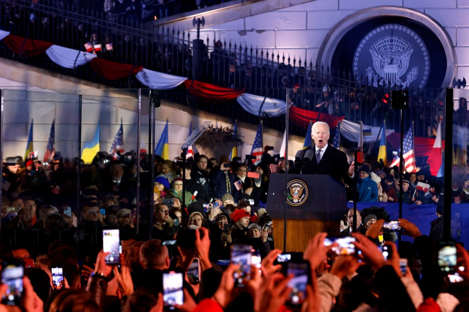 Crowds gather around US, Polish and Ukrainian flags for Biden's speech