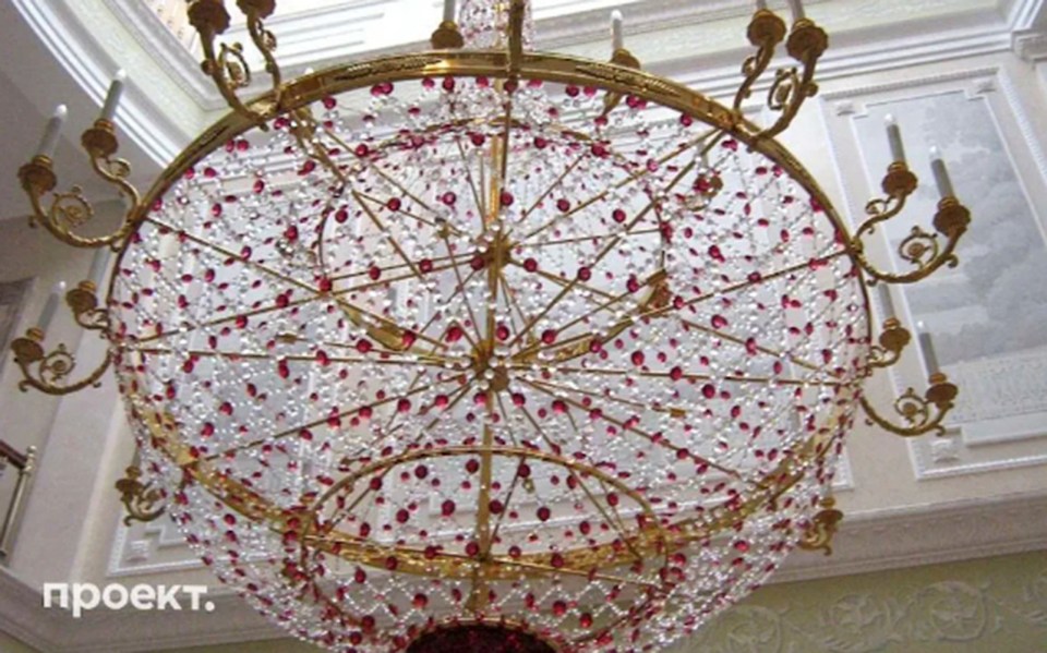 Another picture  shows a huge chandelier seemingly decorated with rubies