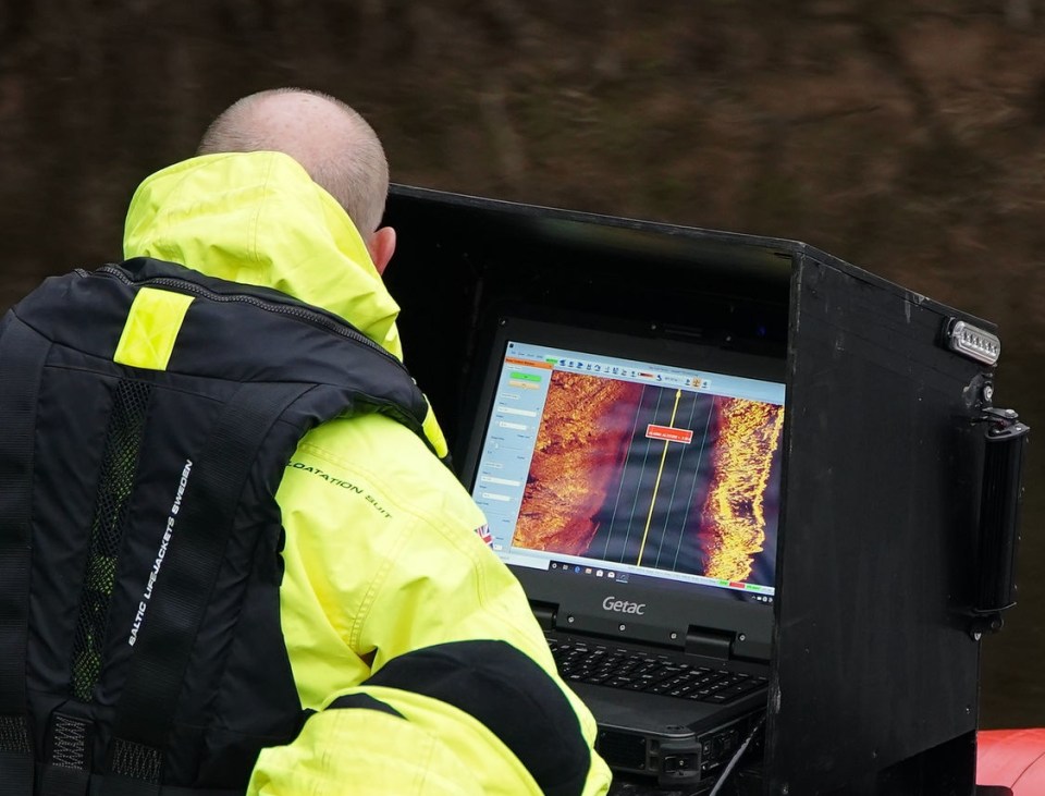 Dive experts are using sonar to scour the river