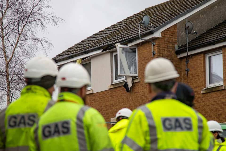 Utilities workers on site following the incident