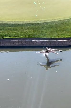 The Phoenix Open was interrupted by a streaker who belly flopped into the water