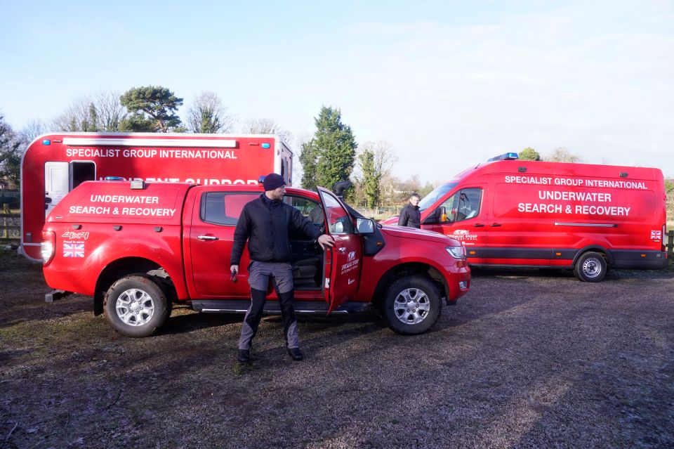 Workers from the private underwater search and recovery company arrive