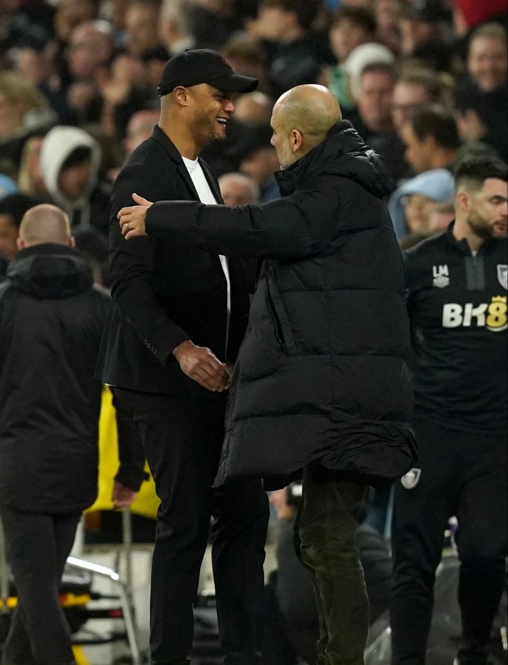 Former Man City defender Vincent Kompany takes defeat well as the Burnley boss is embraced by Etihad chief Pep Guardiola