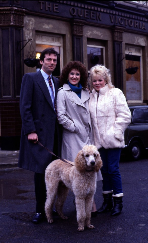 Angie played Angie Watts from 1985 to 1988 – pictured with her screen husband, actor Leslie Grantham, and daughter played by Letitia Dean