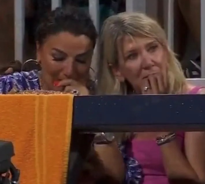 Her mother Maria Andreescu, left, was seen in tears following the injury