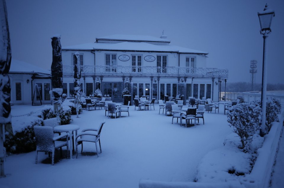 Snow blankets The Rubbing House pub on Epsom Downs in Surrey