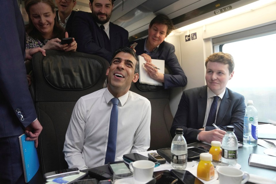 Rishi Sunak spoke to British members of the media, including Sun man Jack Elsom (right), on the Eurostar journey to Paris