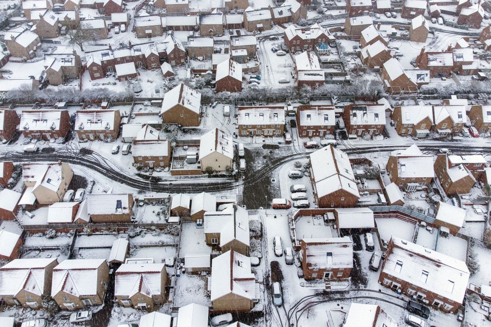 Heavy snow covers houses in Burton Latimer, Northamptonshire