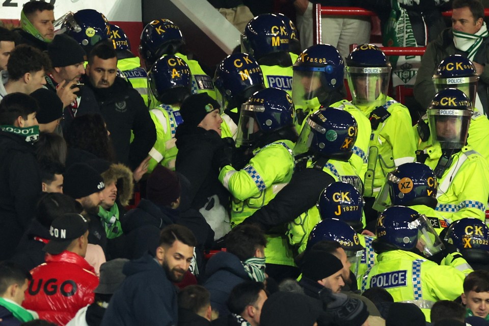 Four Real Betis fans were arrested after throwing items at Man United fans sat in the disabled section