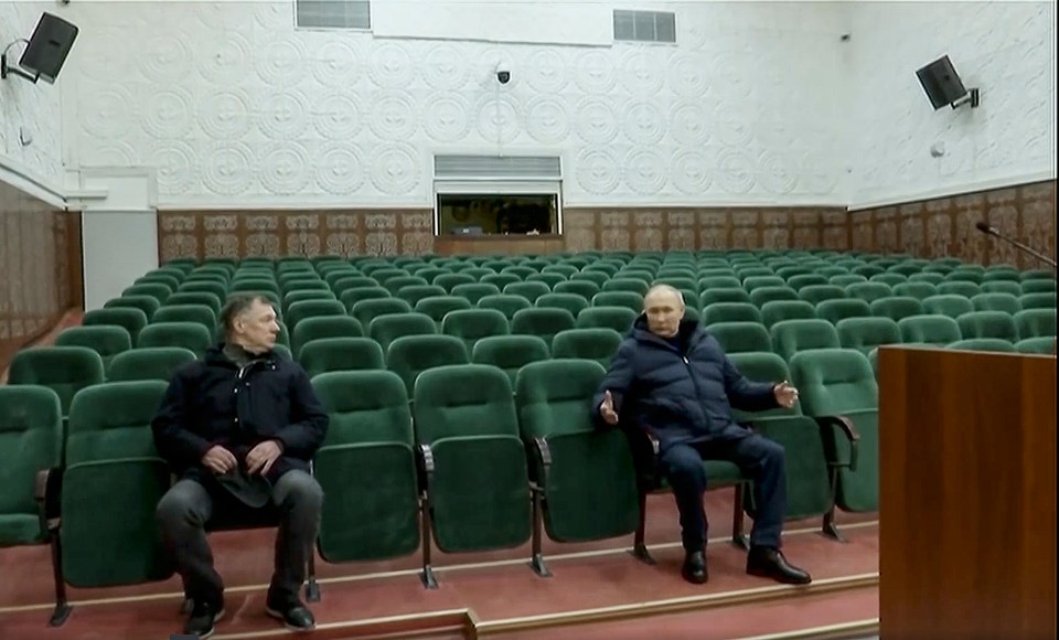 Putin, pictured with Russian Deputy Prime Minister Marat Khusnullin, also visited a theatre without an audience