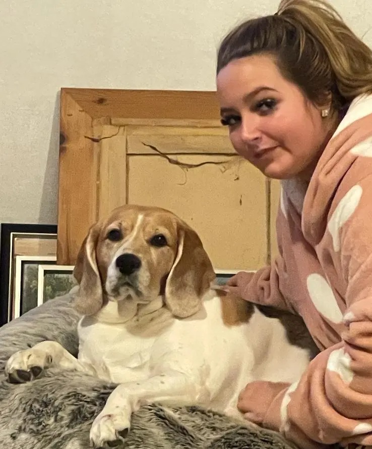 Libbey Peverall is pictured above with her dog Lottie. Lottie was a gift from Charlie to help his sister with her anxiety