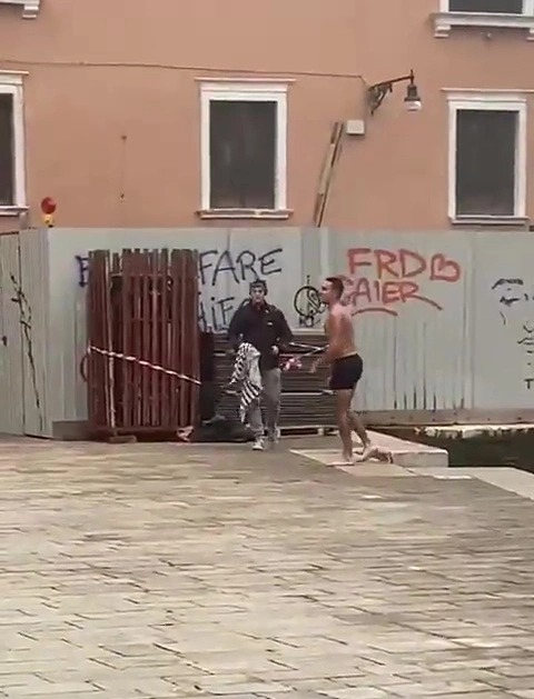 The man was greeted by his friend with a towel