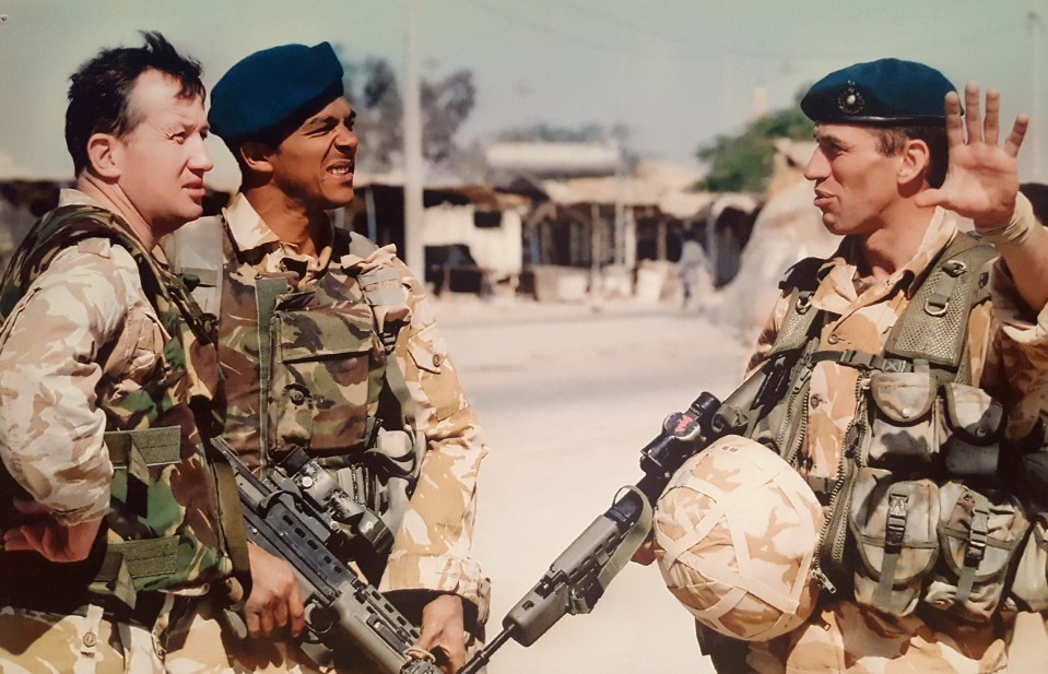 Scotty with pals in action in the Iraq War