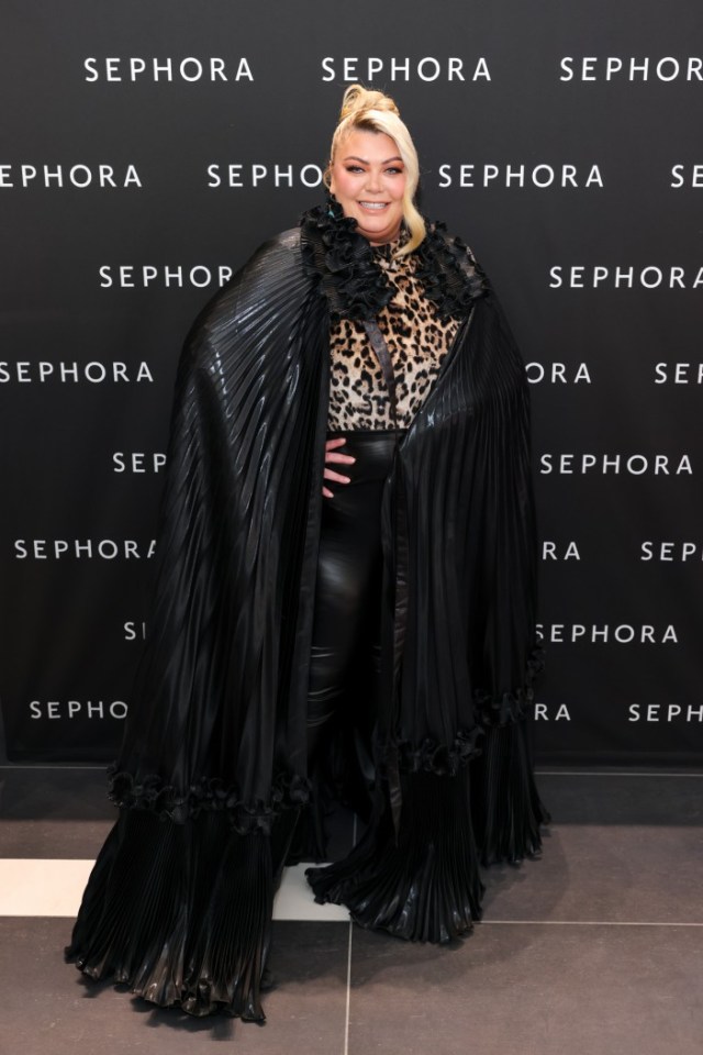 Gemma looked sensational in a striking black sweeping cape at the UK Sephora launch in Westfield, London