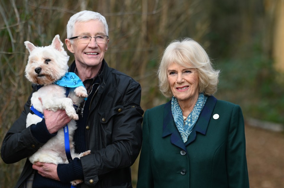 File, 29. March 2023: British comedian, actor and writer Paul O'Grady also known for his drag queen persona Lily Savage, died peacefully last night according to media reports. O'Grady subsequently dropped the character and in the 2000s became the presenter of various television and radio shows, including The Paul O'Grady Show. ASH, ENGLAND - FEBRUARY 02: Camilla, Duchess of Cornwall, patron of Battersea Dogs and Cats Home and Battersea Ambassador Paul OGrady on a brief woodland walk with a rescue dog which is yet to be re-homed, during her visit to Battersea Brand Hatch Centre on February 2, 2022 in Ash, England. (Photo by Stuart C. Wilson - WPA Pool/Getty Images)