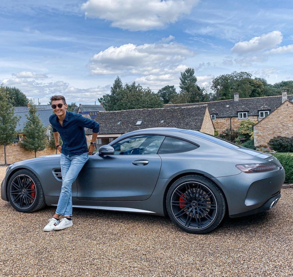 George Russell with his Mercedes AMG GT that cost £97,000