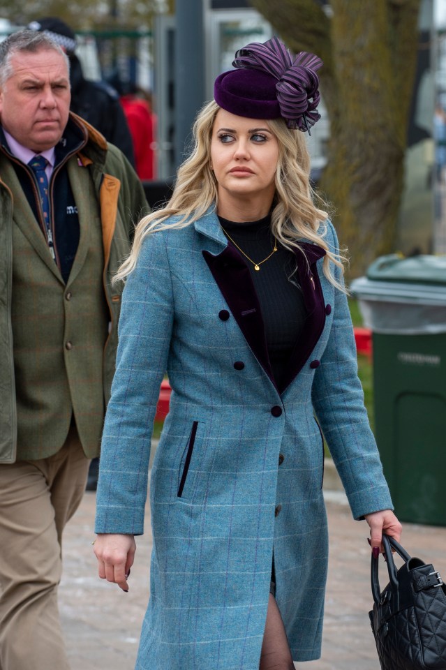 One racegoer looked very elegant indeed, in a blue checked coat and purple fascinator