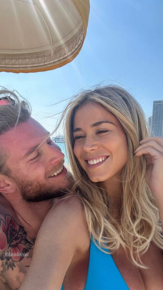 She shared a video alongside Karius as they enjoy the international break