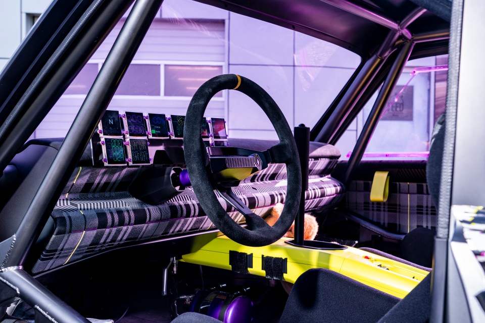 The race seats, belts and quick-release steering wheel are all from Sabelt