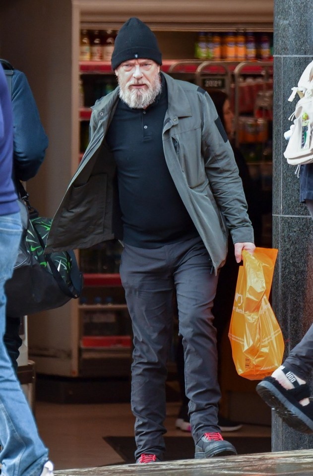 EXCLUSIVE: * Web Set Fee 250 GBP * * Print Fees To Be Agreed * Ex Eastenders Star Adam Woodyatt Picks Up A Snack At Sainsburys In Manchester, Where He Is Starring In My Fair Lady. The actor sported a large beard as he was spotted leaving the supermarket in Manchester city centre. Adam appeared to be channeling his "Homeless" Ian Beale character as he's decided to grow out his beard. Pictured: Adam Woodyatt Ref: SPL5532321 250323 EXCLUSIVE Picture by: SplashNews.com Splash News and Pictures USA: +1 310-525-5808 London: +44 (0)20 8126 1009 Berlin: +49 175 3764 166 photodesk@splashnews.com World Rights