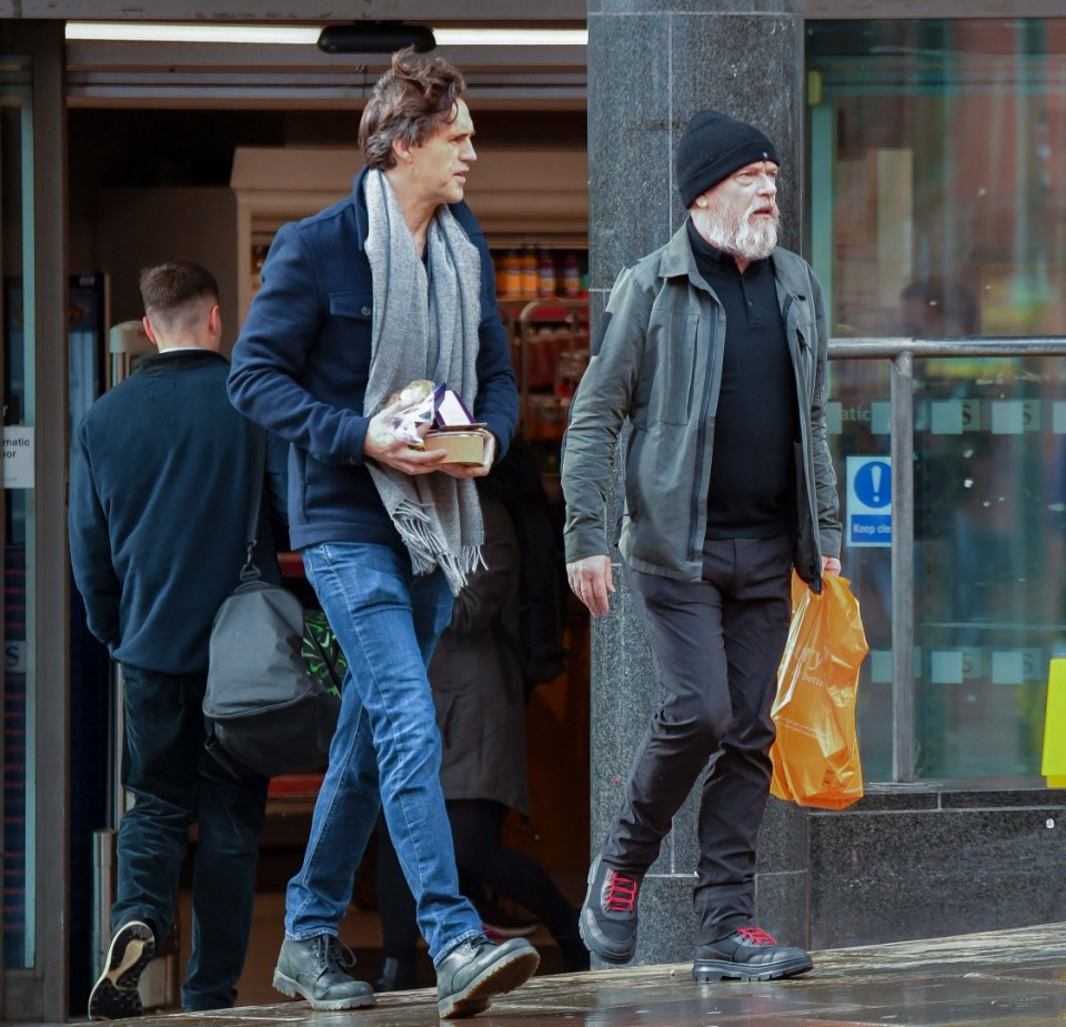 EXCLUSIVE: * Web Set Fee 250 GBP * * Print Fees To Be Agreed * Ex Eastenders Star Adam Woodyatt Picks Up A Snack At Sainsburys In Manchester, Where He Is Starring In My Fair Lady. The actor sported a large beard as he was spotted leaving the supermarket in Manchester city centre. Adam appeared to be channeling his "Homeless" Ian Beale character as he's decided to grow out his beard. Pictured: Adam Woodyatt Ref: SPL5532321 250323 EXCLUSIVE Picture by: SplashNews.com Splash News and Pictures USA: +1 310-525-5808 London: +44 (0)20 8126 1009 Berlin: +49 175 3764 166 photodesk@splashnews.com World Rights