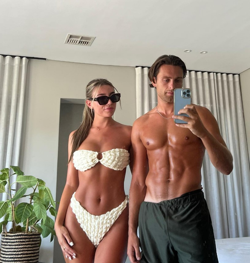 Rosie and Casey showed off their tans - and their bodies - in the new snap