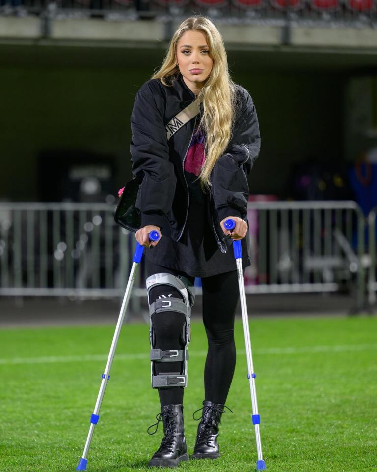 The beautiful footballer posted photos of her walking on crutches