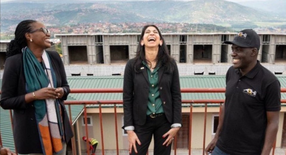 Suella Braverman shared a moment with staff building migrant facilities during her visit to Rwanda