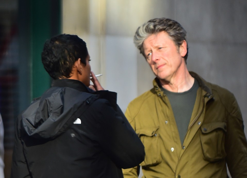 Naga seen enjoying a cigarette with her co-star Charlie Stayt outside a pub