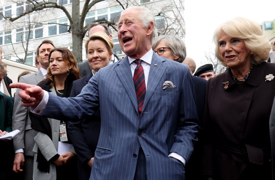 The royal couple laughed with gathered crowds