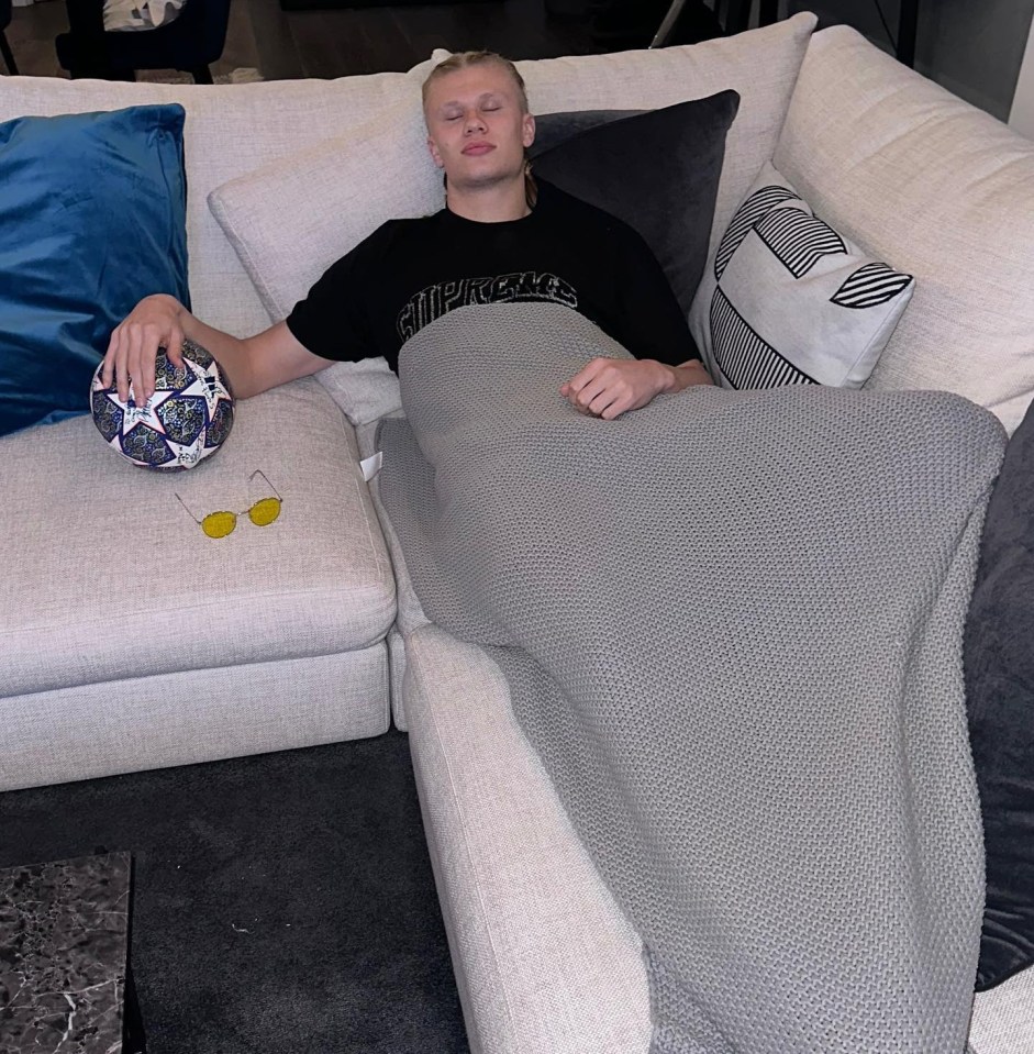 Erling Haaland took a nap with his match ball and tinted sunglasses on Wednesday