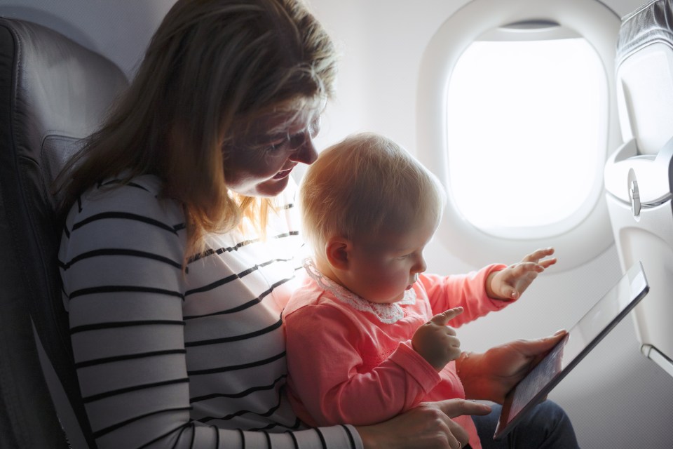 Parents have been warned against having small children on their laps during flights