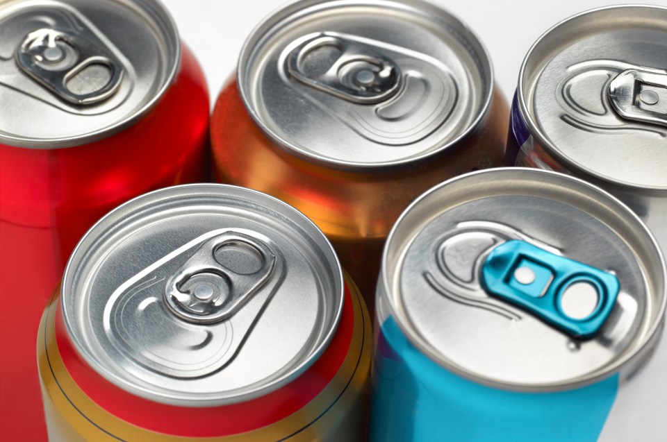 Cola soda fizzy drinks cans