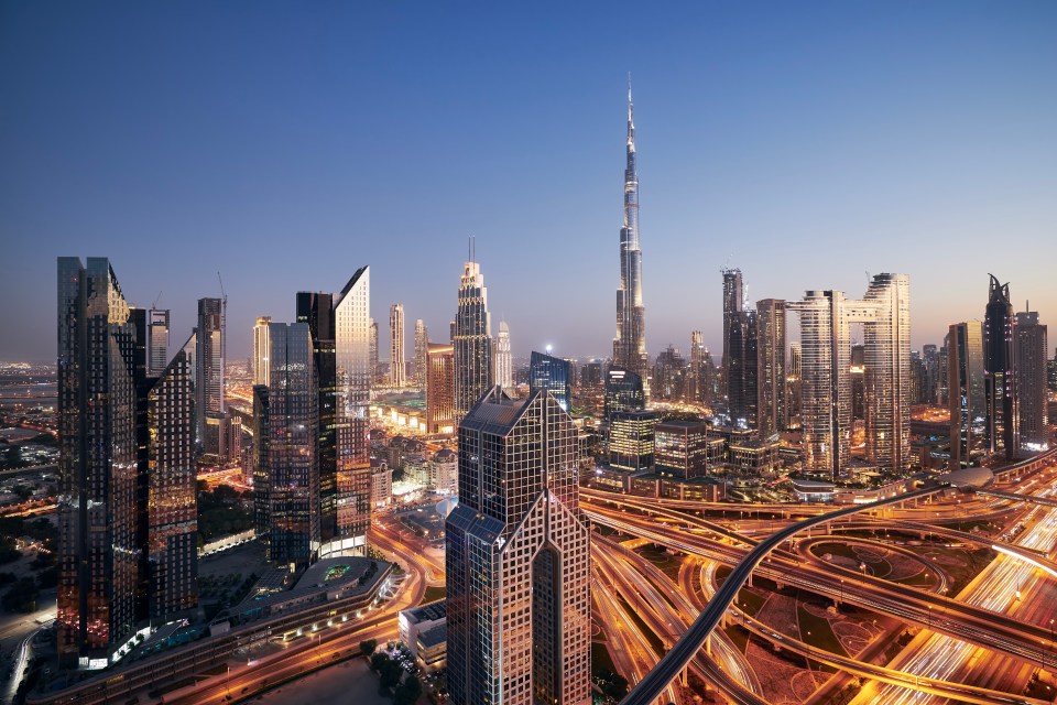 an aerial view of a city skyline at night