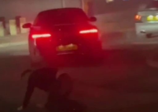 Cops are hunting for the driver of this car after it ploughed into people outside a bowling alley