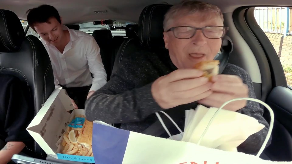 Wayve’s founder looks on as the billionaire scoffs fish and chips inside the vehicle