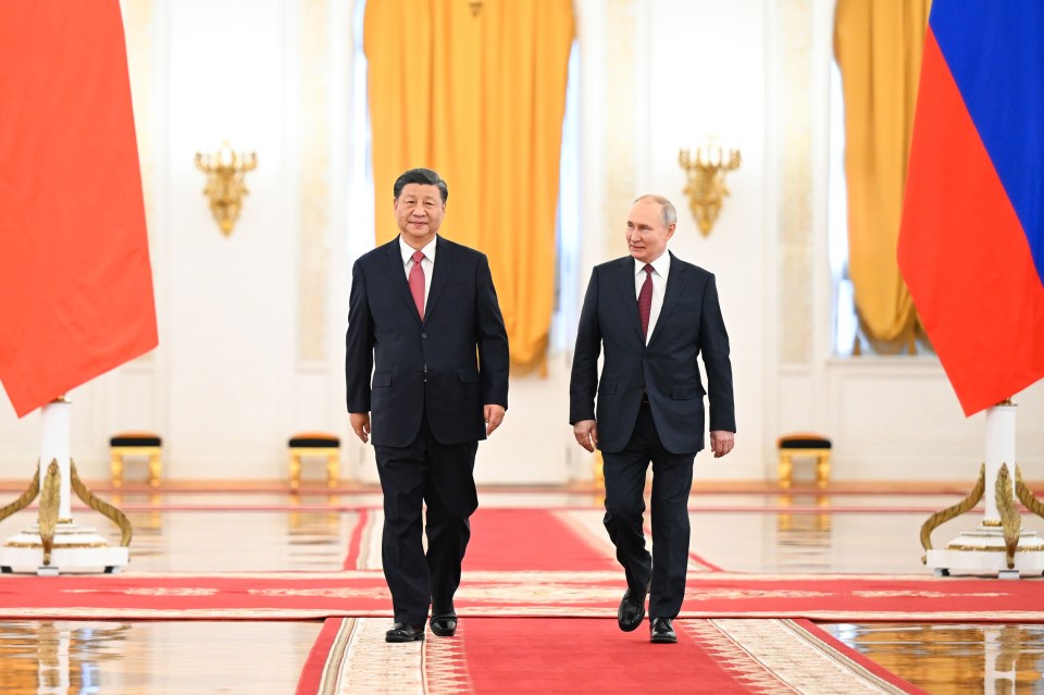 Body language experts said Vladimir Putin looked ‘nervous’ as he met Xi Jinping