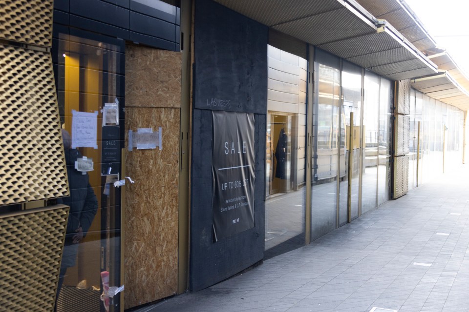 Doors and windows are boarded up